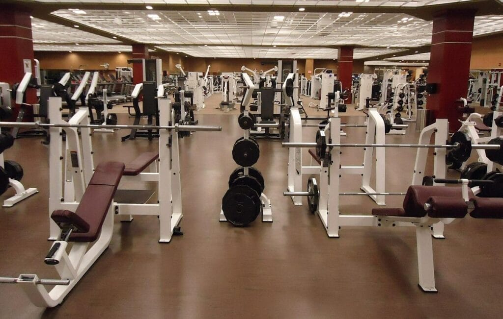 Gym with weight training equipment to design and perform a routine